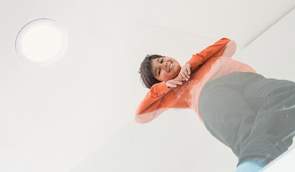 boy under Natural Light residential tubular skylight mobile