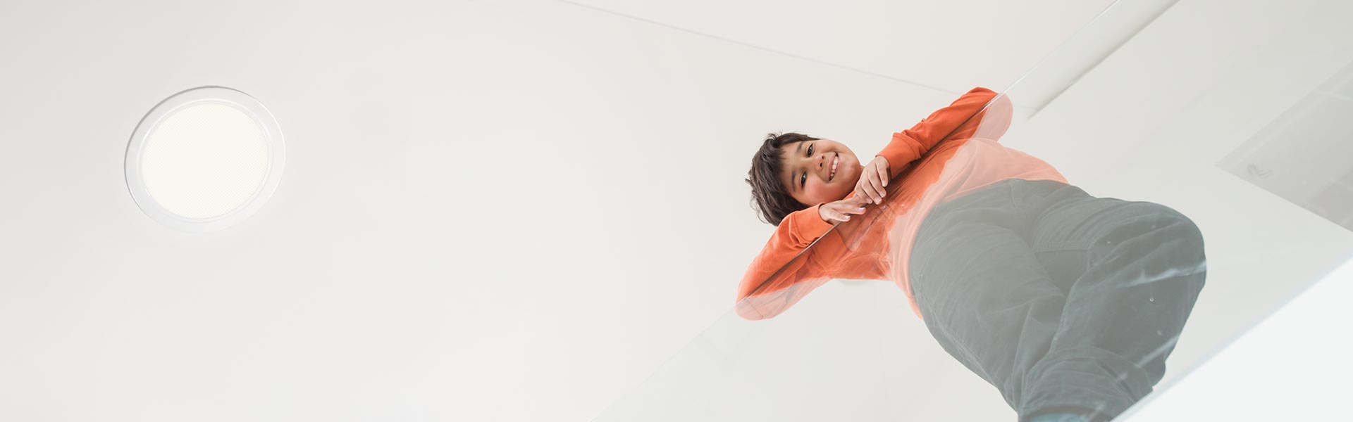 boy under Natural Light residential tubular skylight